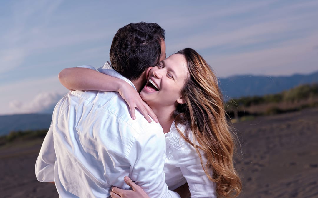 A couple smiling after an intensive marriage retreat